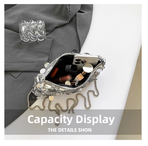 Interior view showing the capacity of the sequined handbag for phone and makeup