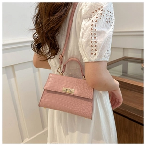 Pink crocodile pattern shoulder bag with gold twist lock and top handle for women