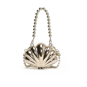 Silver metallic shell shaped evening clutch bag with beaded handle and chain strap