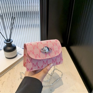 Pink monogram mini shoulder bag with silver planet charm and metal chain strap