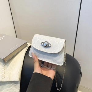 White mini crossbody bag with M-letter print and silver planet buckle detail