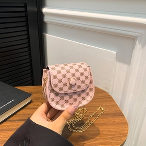 Pink vintage mini crossbody bag with floral prints and elegant gold chain strap
