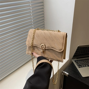 Quilted beige crossbody bag with V-shaped stitching and golden chain strap for women