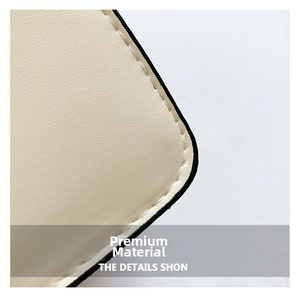 Close-up of beige leather texture with precise stitching and black oil edge finish