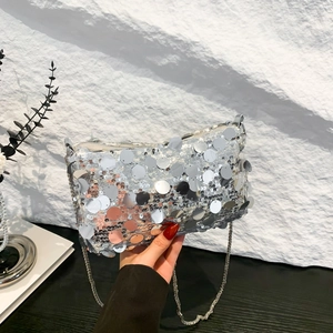 Silver sequin handbag with metal chain strap, shining texture for party and evening events