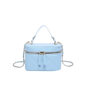 Light blue quilted leather crossbody bag with gold chain strap and top handle design