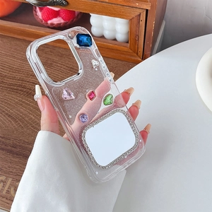 Detail of luxury iPhone case with colorful gems, silver glitter and rhinestone mirror frame