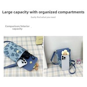 Capacité interne du sac à fleurs en denim bleu montrant le rangement du téléphone