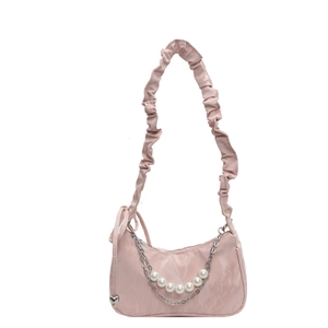 Pink crescent shoulder bag with ruched handle, silver chain and large faux pearl accents