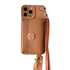 Caramel leather iPhone case with flower wallet and crossbody strap in white background