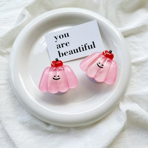 Pink cherry jelly phone grip holder with smiling face on elegant white background