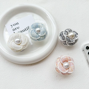 Elegant tweed camellia flower phone socket grips with pearl center in four pastel colors