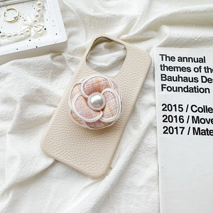 Elegant phone grip holder with camellia flower in tweed and pearl on cream leather