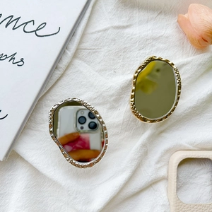 Irregular electroplated mirror phone grip with hammered metal texture in gold and silver