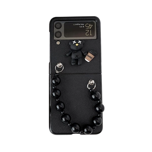 Samsung Galaxy Z Flip matte black phone case with punk bear charm and large bead handle chain