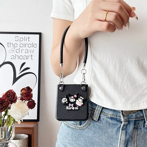 Kuromi themed black leather folding phone case with wrist strap and cartoon 3D figure