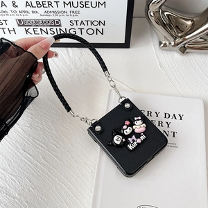 Detail of Kuromi leather flip case for Z Flip with a woven hand strap and 3D figures