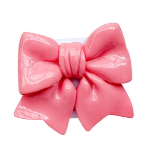 3D glossy pink bow phone stand and mirror accessory on a clean white background