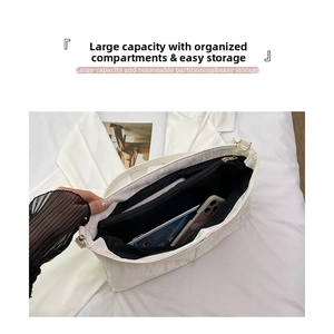 Interior view of white tote bag showing spacious compartments for tablet and wallet