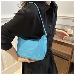 Glossy bright blue patent leather small shoulder bag with adjustable strap and U-shape design