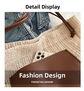 Detailed macro view of woven straw tote bag texture with brown faux leather pocket