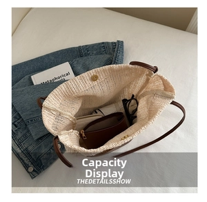 Internal view of beige straw tote bag showing large capacity for daily essentials