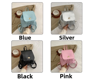 Detail of minimalist leather backpacks in blue, silver, black, and pink with metal locks