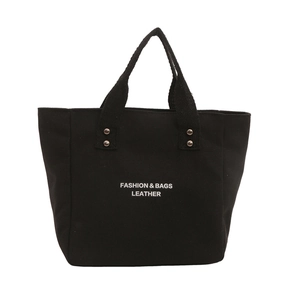 Grand sac cabas noir en toile avec lettrage tendance et rivets argentés pour femme