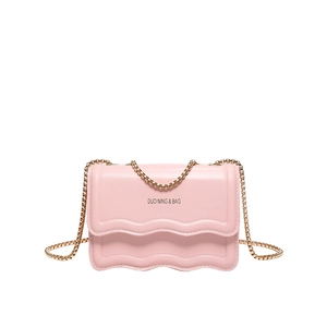 Pink crossbody square bag with wave-edge flap and golden chain strap on white background