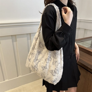 Fashionable floral canvas tote bag for women with blue butterfly pattern for daily commuting