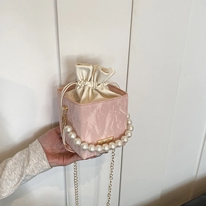 Pink marble pattern bucket bag with pearl handle and drawstring closure for women