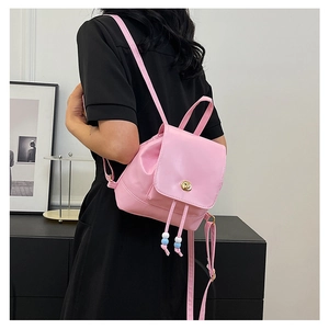 Pink PU leather mini backpack with gold twist lock and bead drawstring detail
