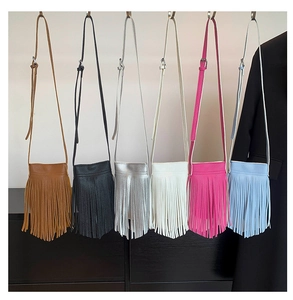 Detailed display of assorted tassel crossbody phone bags in various stylish leather colors