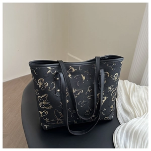 Macro view of butterfly embroidery and jacquard texture on Chinese style tote bag
