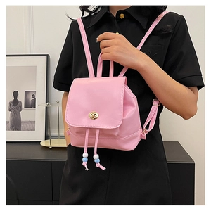 Pink PU leather mini backpack detail with gold twist lock and bead drawstring