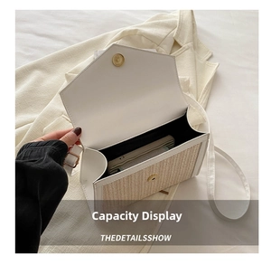 Interior capacity display of straw and white leather crossbody bag with magnetic closure