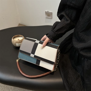Modern color-block square underarm bag with gold chain strap and brown handle for women