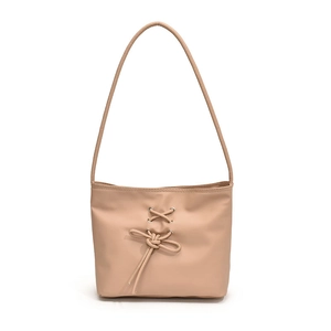 Chic beige tote bag with sweet ribbon bow design and large capacity for women