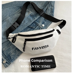 Detailed view of white nylon waist bag with black adjustable strap and brand logo