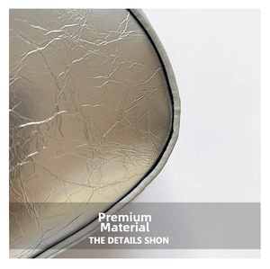 Macro detail showing silver metallic crinkle texture and premium fabric of the shoulder bag