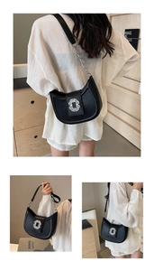 Vues détaillées d'un sac demi-lune en cuir noir avec boucle soleil ornée de strass