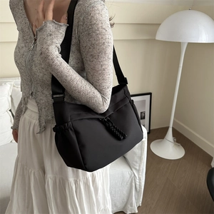 Black large capacity Oxford fabric crossbody tote bag with woven rope detail