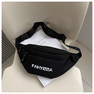 Close-up of durable black nylon fanny pack with adjustable strap and plastic buckle