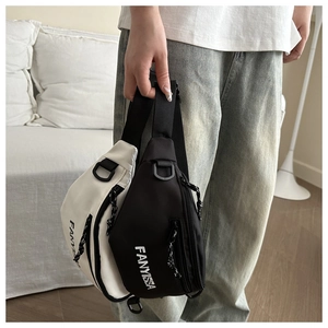 Detailed view of waterproof nylon chest bags in black and white with FANYISSA logo print