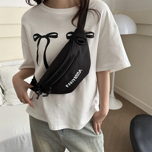 Fashionable black nylon dumpling shoulder bag with white lettering and adjustable strap