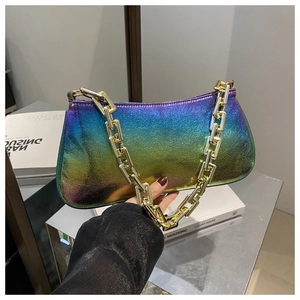 Macro detail of holographic gradient leather and chunky gold chain on a baguette bag