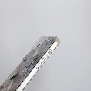 Detailed side view of iPhone case featuring butterfly motifs and precise camera protection