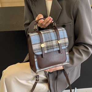 British style plaid backpack for women with brown leather trim and top handle design