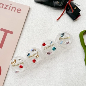 Colorful crystal rhinestone phone grip stand with various gem shapes and Diamonds text