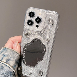 Silver glitter iPhone case with rhinestone gems and central mirror detail for a luxury look